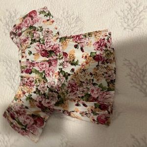 low-cut floral blouse